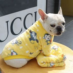 Detail of warm yellow fleece pet sweater with cartoon monkey prints for small dogs