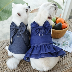 Denim pet dress for dogs and cats with a large bow and D-ring for leash attachment