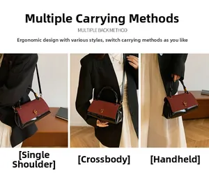 Detail view of burgundy suede and black faux leather bag showing crossbody and handheld modes