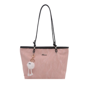 Pink pleated tote bag for women with black leather straps and plush charm on white background