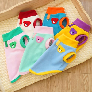 Fleece pet vests with bear patch and D-ring leash attachment in colorful contrast styles