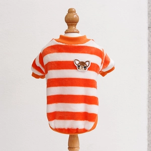 Close-up of orange striped pet fleece with embroidery and ribbed edges on a mannequin
