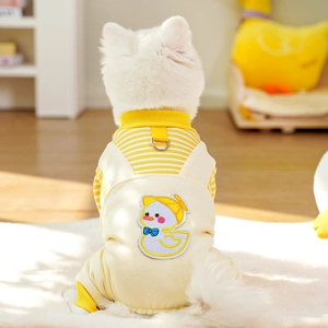 Detail of pet jumpsuit featuring cartoon duck embroidery and D-ring for leash attachment