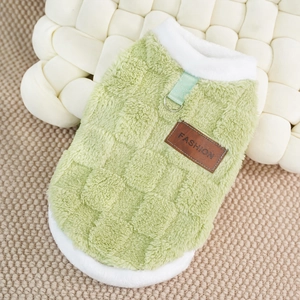Detail view of green checkerboard plush pet vest with D-ring and fashion patch