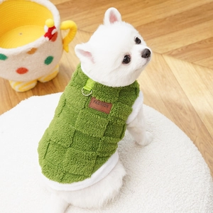 Close-up of green waffle fleece pet vest with metal D-ring and fashion leather patch