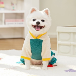 Close-up of cozy fleece dog onesie featuring contrast color-block design and soft texture