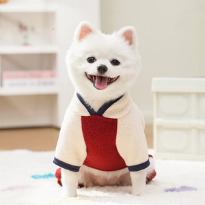 Detail view of cream and burgundy pet fleece jumpsuit with contrast trim for dogs