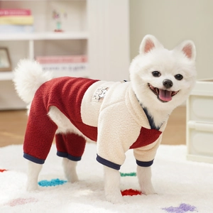 Close-up of warm fleece pet jumpsuit with color-block design and bear embroidery