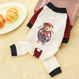 Detail of warm dog hoodie featuring a cartoon bear print and a durable metal D-ring attachment