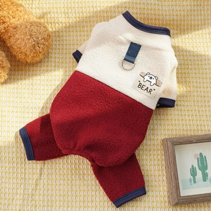 Detail of fleece pet jumpsuit with contrast colors, BEAR patch and D-ring for leash