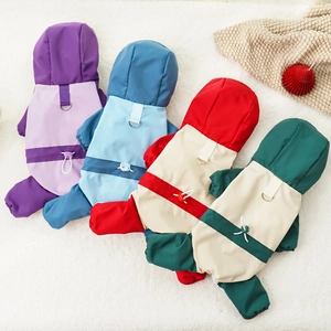 Detail of waterproof pet winter suit with metal D-ring leash attachment and drawstring waist