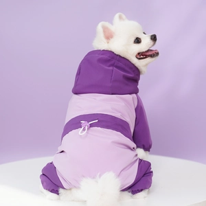 Detail of waterproof dog jumpsuit with adjustable drawstring on back in purple