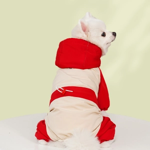Detail of waterproof pet ski suit showing adjustable drawstring and warm red hood