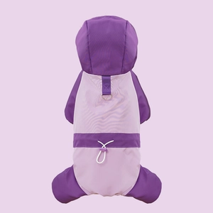 Close-up of purple waterproof pet jumpsuit with metal D-ring and adjustable waist buckle
