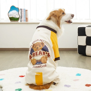 Detail of dog fleece hoodie featuring teddy bear print and adjustable drawstring hem