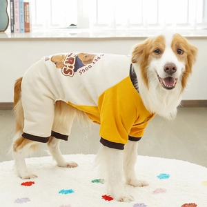 Detail of yellow and white dog jumpsuit with teddy bear print and ribbed cuffs