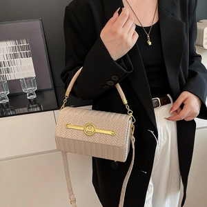 Beige woven box handbag with gold M-logo buckle and detachable shoulder strap