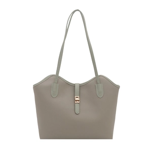 Taupe textured leather tote bag with wavy rim, gold buckle lock, and double shoulder straps
