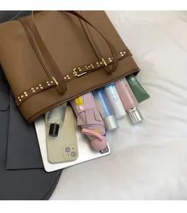 Top view of brown lychee grain tote bag showing spacious interior for tablets and cosmetics