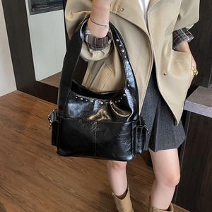 Retro black studded large Hobo shoulder bag with metallic rivets and side flap pockets