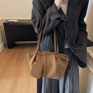 Brown suede tote bag with matching mini pouch and metal side buckles for women
