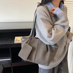 Taupe suede tote bag with silver side buckles and matching mini pouch for urban commute