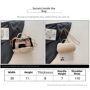 Size chart showing handbag dimensions and capacity comparison with a mobile phone