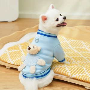 Detail of blue pet sweatshirt featuring 3D plush bear, striped pocket and metal D-ring