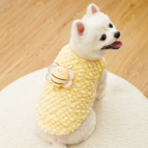 Close-up of yellow popcorn fleece pet vest with 3D bee decor and metal D-ring for leash