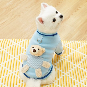 Detail of light blue dog sweatshirt featuring 3D plush bear pocket and metal D-ring buckle