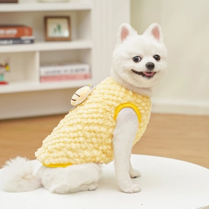 Detail of warm yellow sherpa fleece pet vest featuring a cute 3D plush bee on a Pomeranian