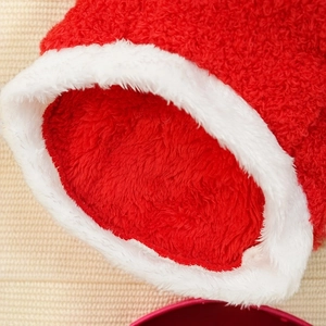 Detail of red and white thickened plush fabric with soft fleece texture for pet clothing