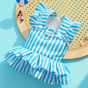 Detail of blue striped dog dress featuring ruffle edges and breathable mesh lining