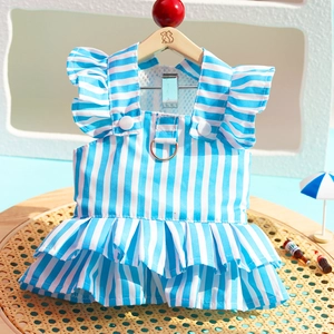 Detail of blue striped pet dress with double ruffles and metal D-ring for leash attachment