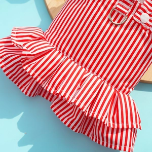Detail view of red striped dog dress featuring ruffles and D-ring for leash attachment
