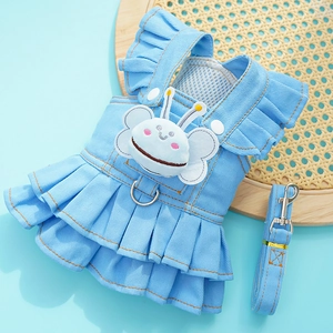 Detail of blue denim pet dress with plush bee, D-ring and matching leash attachment