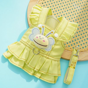 Detail of yellow pet denim harness dress with cartoon bee and matching leash