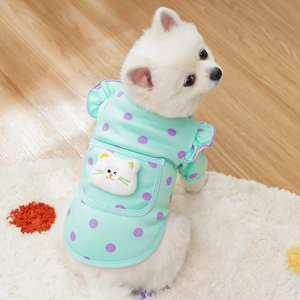 Detail of mint green pet shirt with purple dots and cute 3D cat patch on back