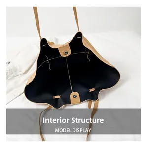 Interior view of large capacity suede tote bag with magnetic closure and brown finish
