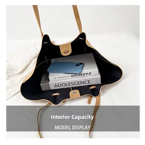 Macro view of khaki tote bag interior capacity with magnetic closure and items