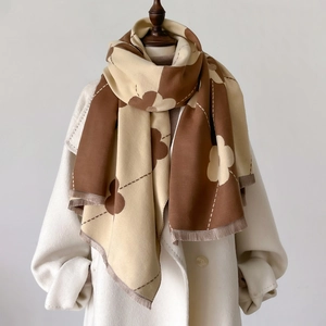 Dual-tone brown and beige floral scarf with fringe detail for winter style