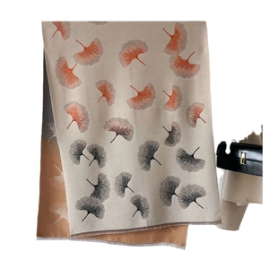 Elegant autumn winter ginkgo leaf print shawl with tassels in beige and brown tones