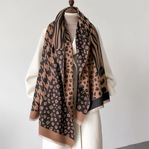 Fashion houndstooth and leopard print patchwork pashmina scarf styled on a winter coat