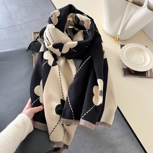 Elegant floral knit scarf with fringe and contrast jacquard pattern for winter warmth