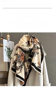 Detail of vintage floral pashmina shawl with fringes and soft cashmere-like texture