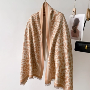 Beige leopard print cashmere feel scarf with tassel edge for winter warmth
