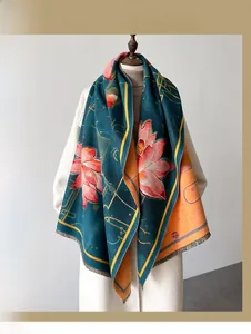 Close-up of elegant lotus print scarf with thick cashmere texture and warm drape