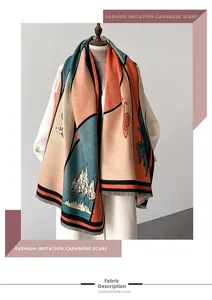 Close-up of artistic color block landscape print and soft fringe on cashmere scarf