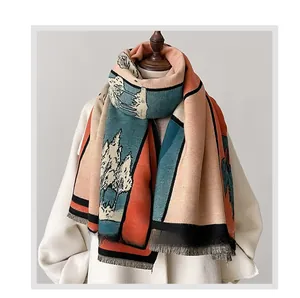 Detailed close-up of scenic landscape art print on thick warm knitted winter shawl scarf