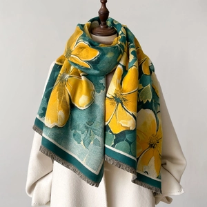 Floral cashmere-like thick shawl with yellow vintage prints and tassels on white coat